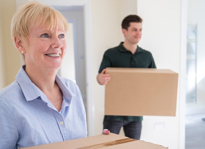 Senior woman downsizing to a smaller home